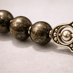 Pyrite Bead Bracelet with Hamsa Hand Charm - Karma & Peace